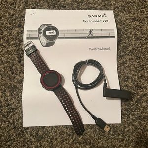 Garmin Forerunner 220 with charger and manual
